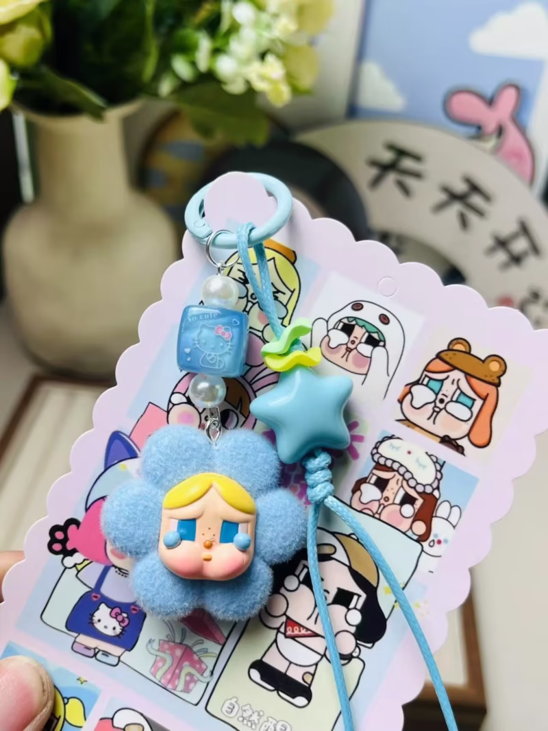 Gift of three-dimensional dolls to students' schoolbags from Cartoon Creative's New Crybaby × Flying Little Police Keychain